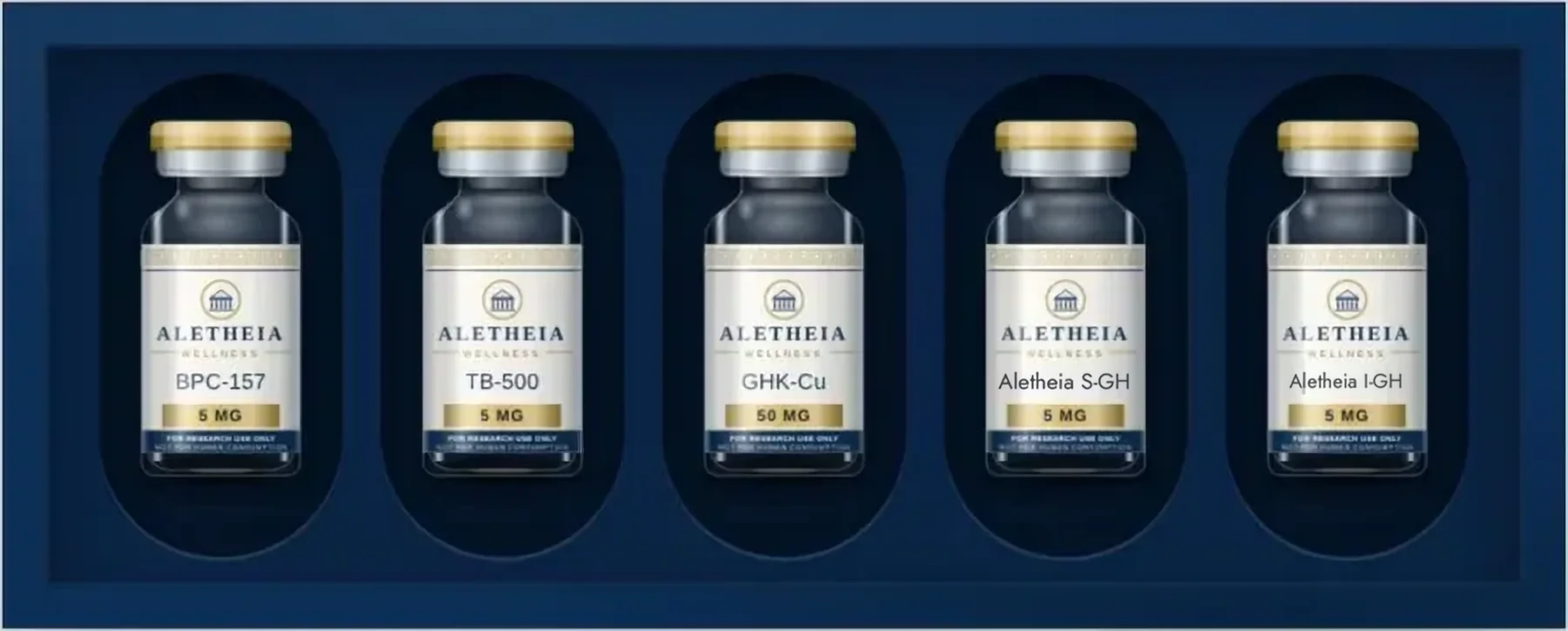 Five Aletheia vials, caps toward the lid